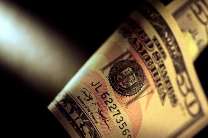 Greenback eases forward of key US inflation report